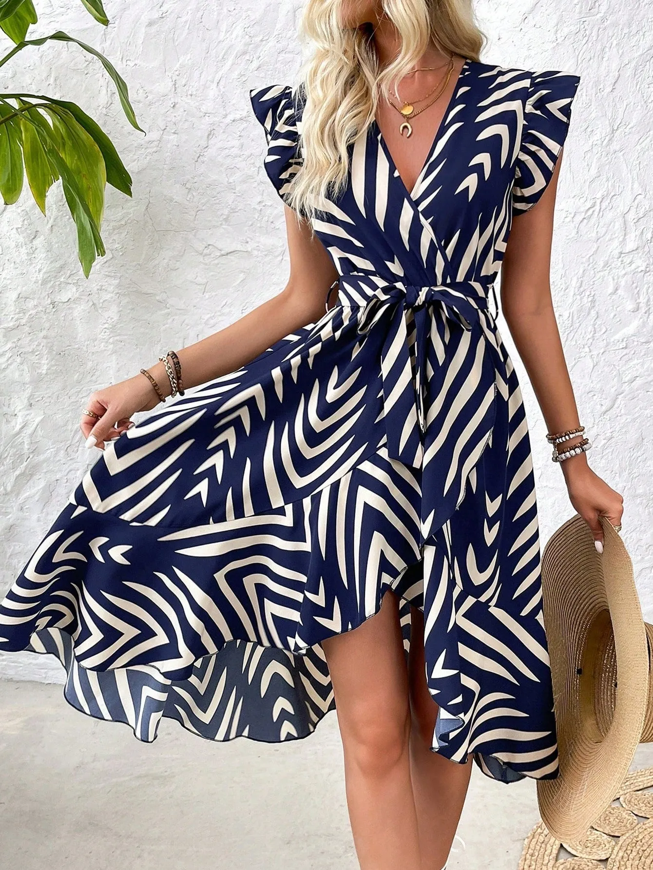 Chic Irregular Stripe Maxi Dress with Flutter Sleeves and Wrap Design