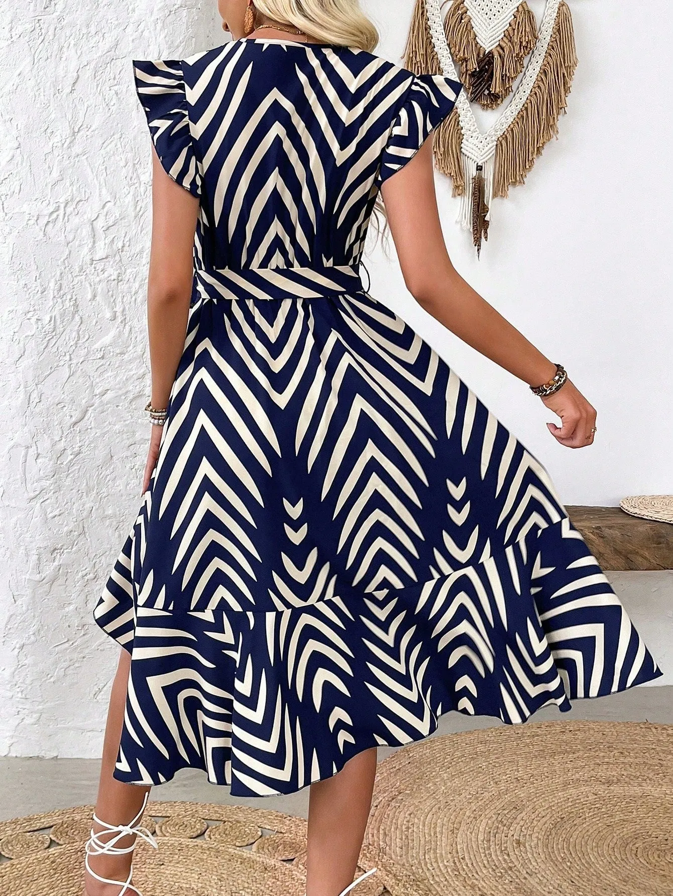 Chic Irregular Stripe Maxi Dress with Flutter Sleeves and Wrap Design