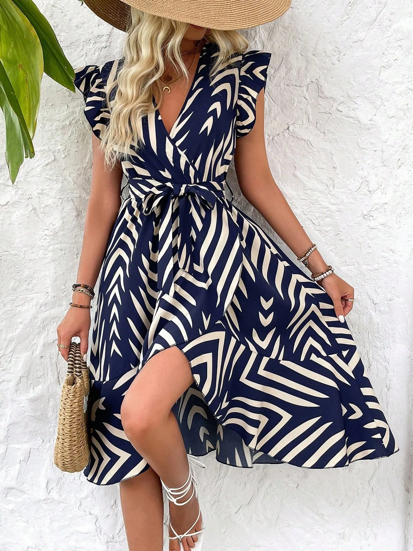 Chic Irregular Stripe Maxi Dress with Flutter Sleeves and Wrap Design
