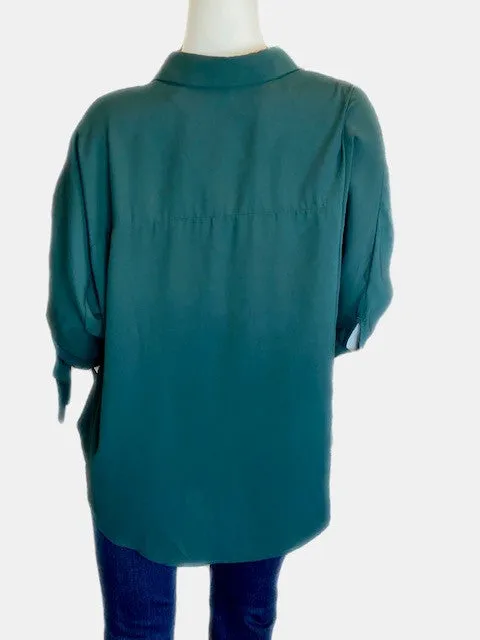 Green button down top with bows on the sleeve