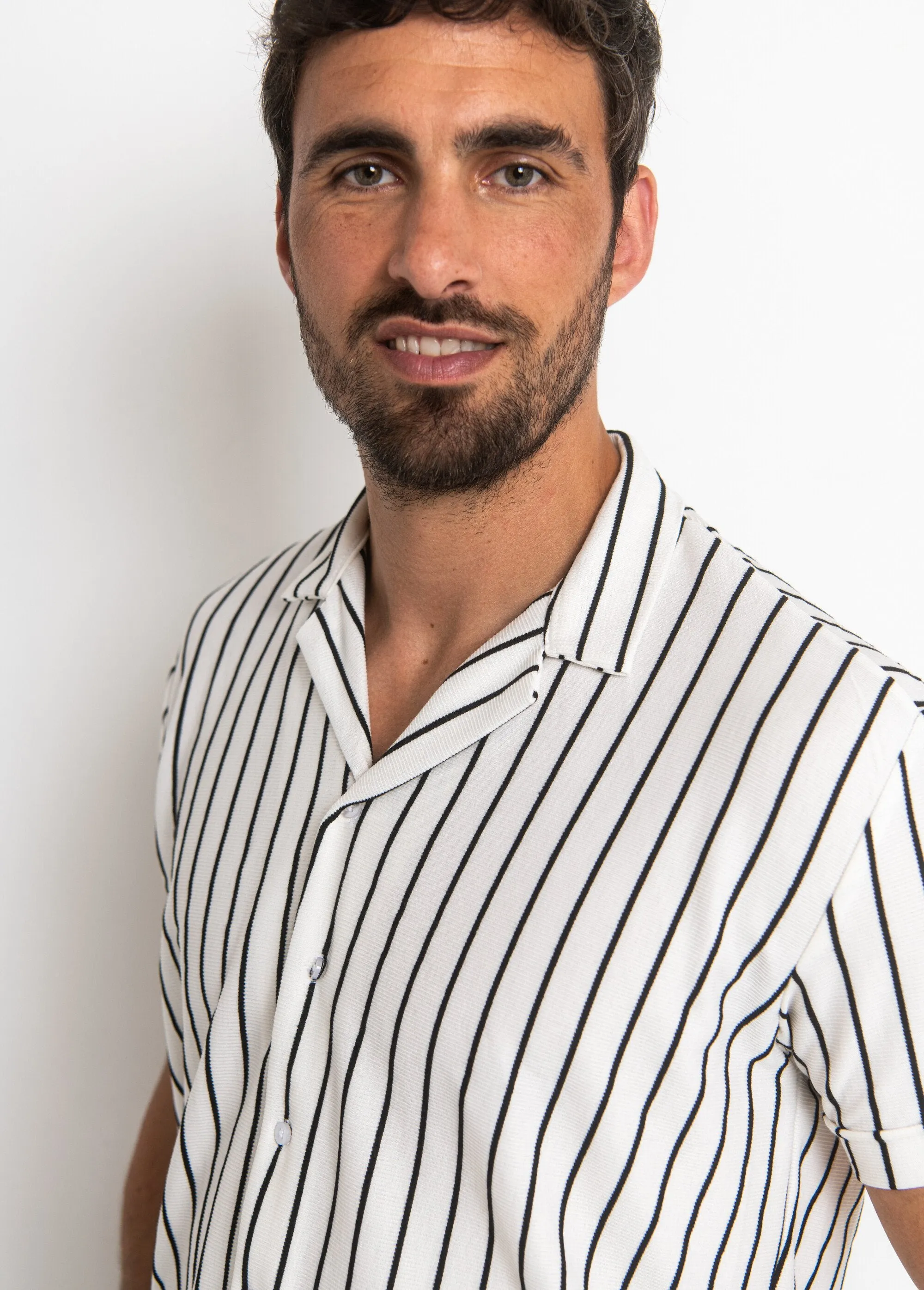 Striped button-up polo shirt style
