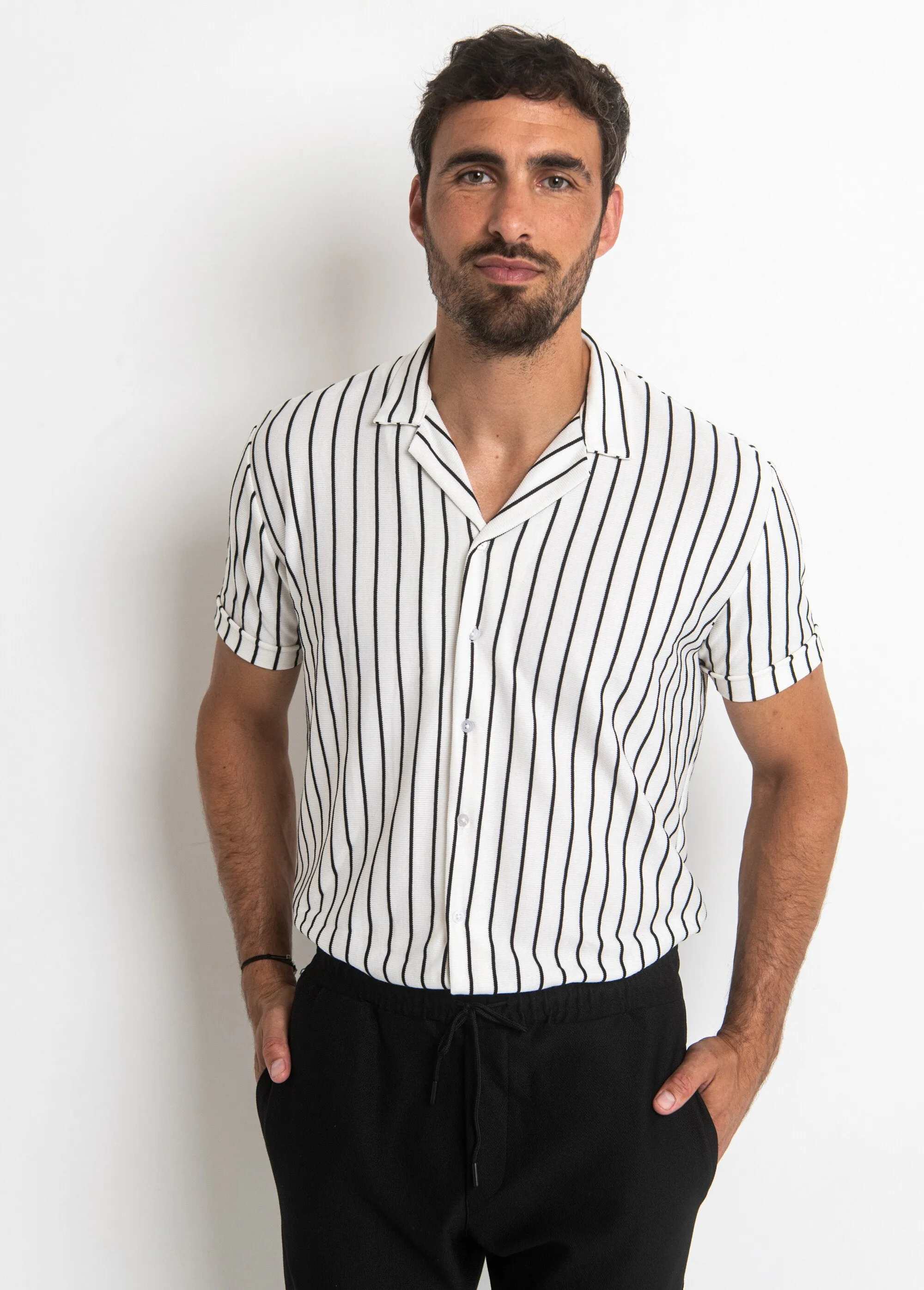 Striped button-up polo shirt style